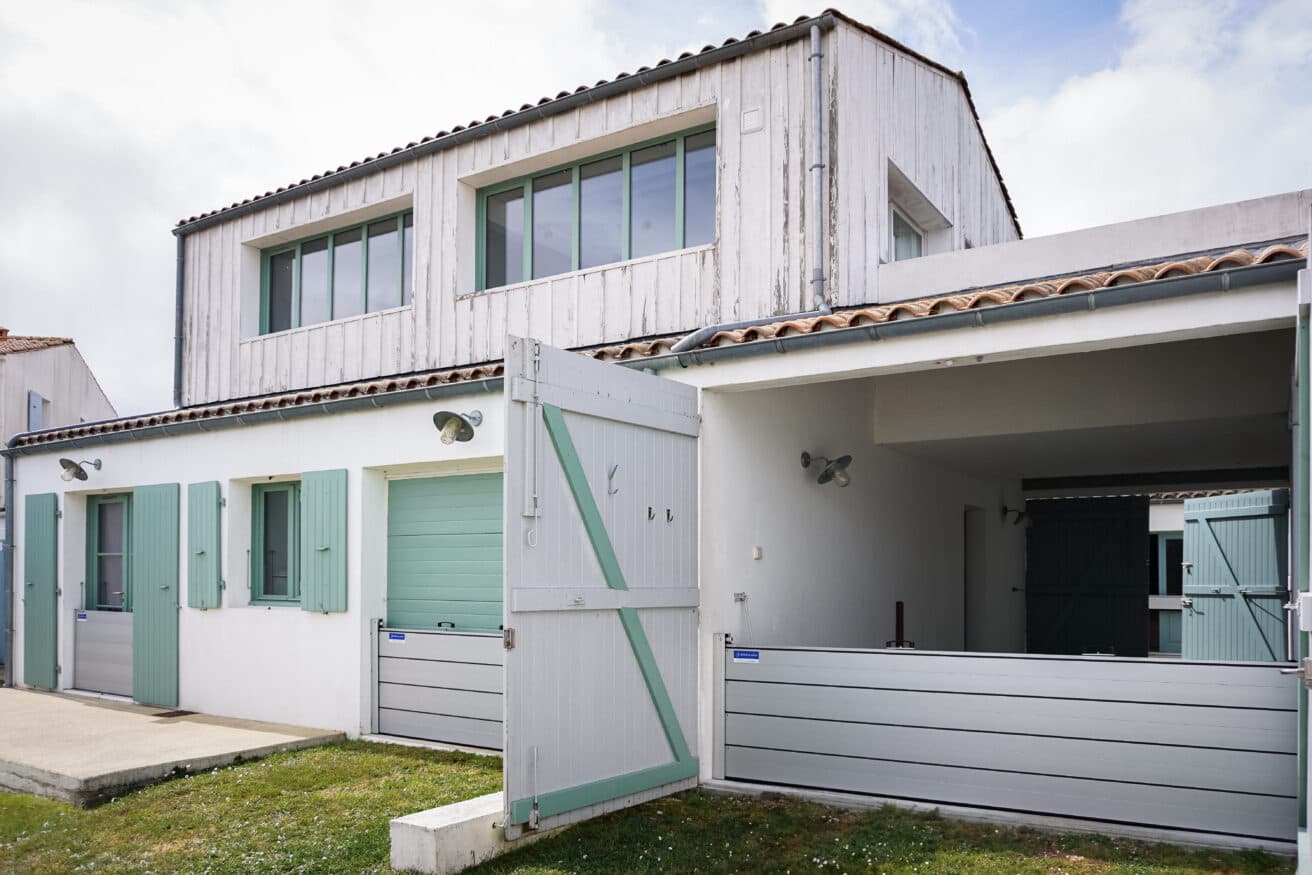 maison et garage equipés de batardeau anti inondation